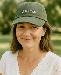 Woman wearing Green Cap with 'Olive You' Print
