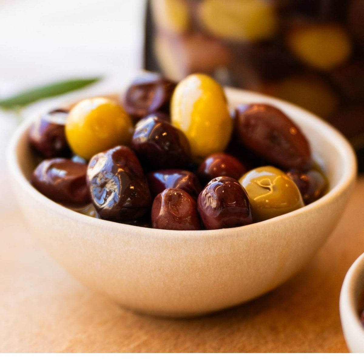 Four Flavours of Artisan Olives: Manuka Smoked, Sichuan Chilli, Truffle Oil, and Lemon Myrtle & Kawakawa