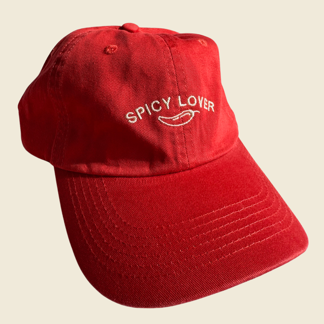 Orange-red cap with Spicy Lover print